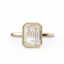 The Bea emerald-cut lab-grown diamond bezel ring in 18K yellow gold, top view