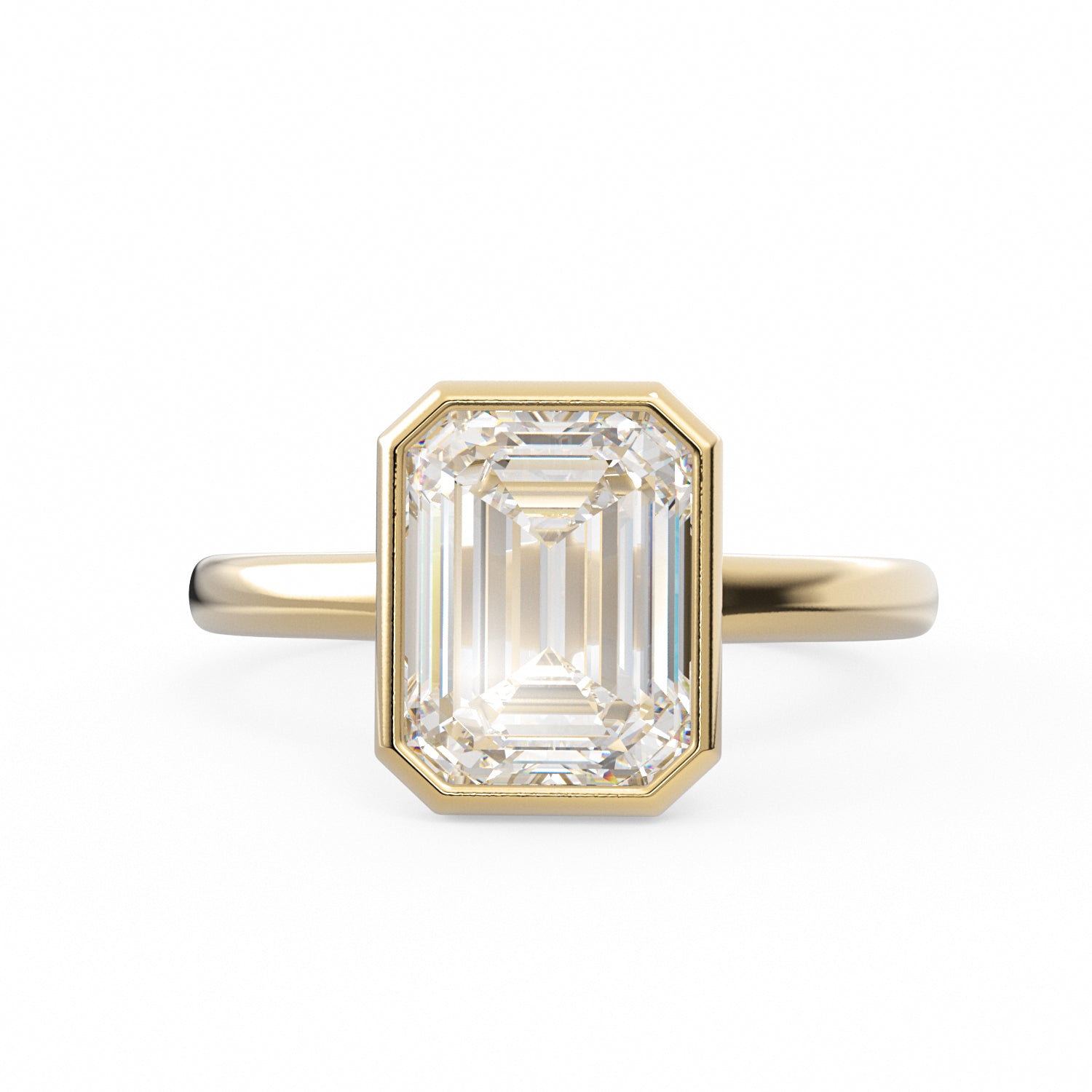 The Bea emerald-cut lab-grown diamond bezel ring in 18K yellow gold, top view