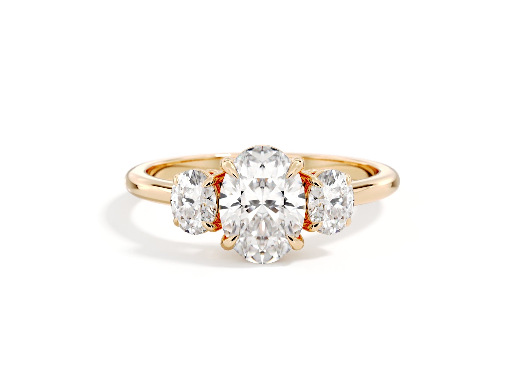 The Aurelia three-stone trilogy lab-grown diamond ring in 18K yellow gold, front view