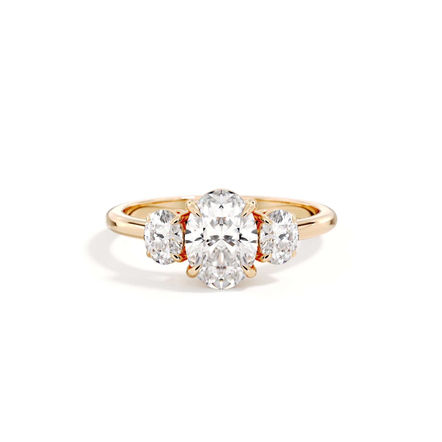 The Aurelia three-stone trilogy lab-grown diamond ring in 18K yellow gold, front view